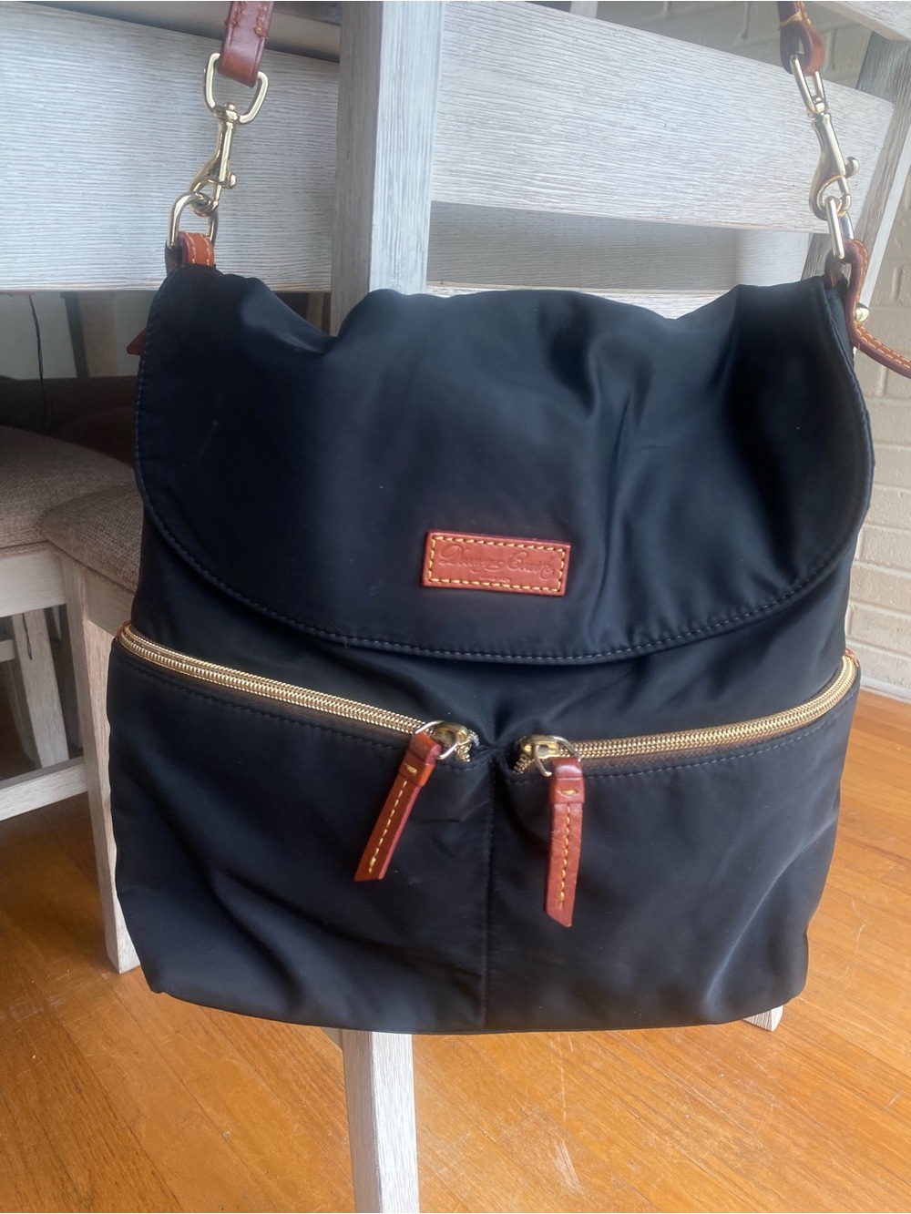 Dooney & Bourke Black Nylon Messenger Bag with Brown Leather Trim